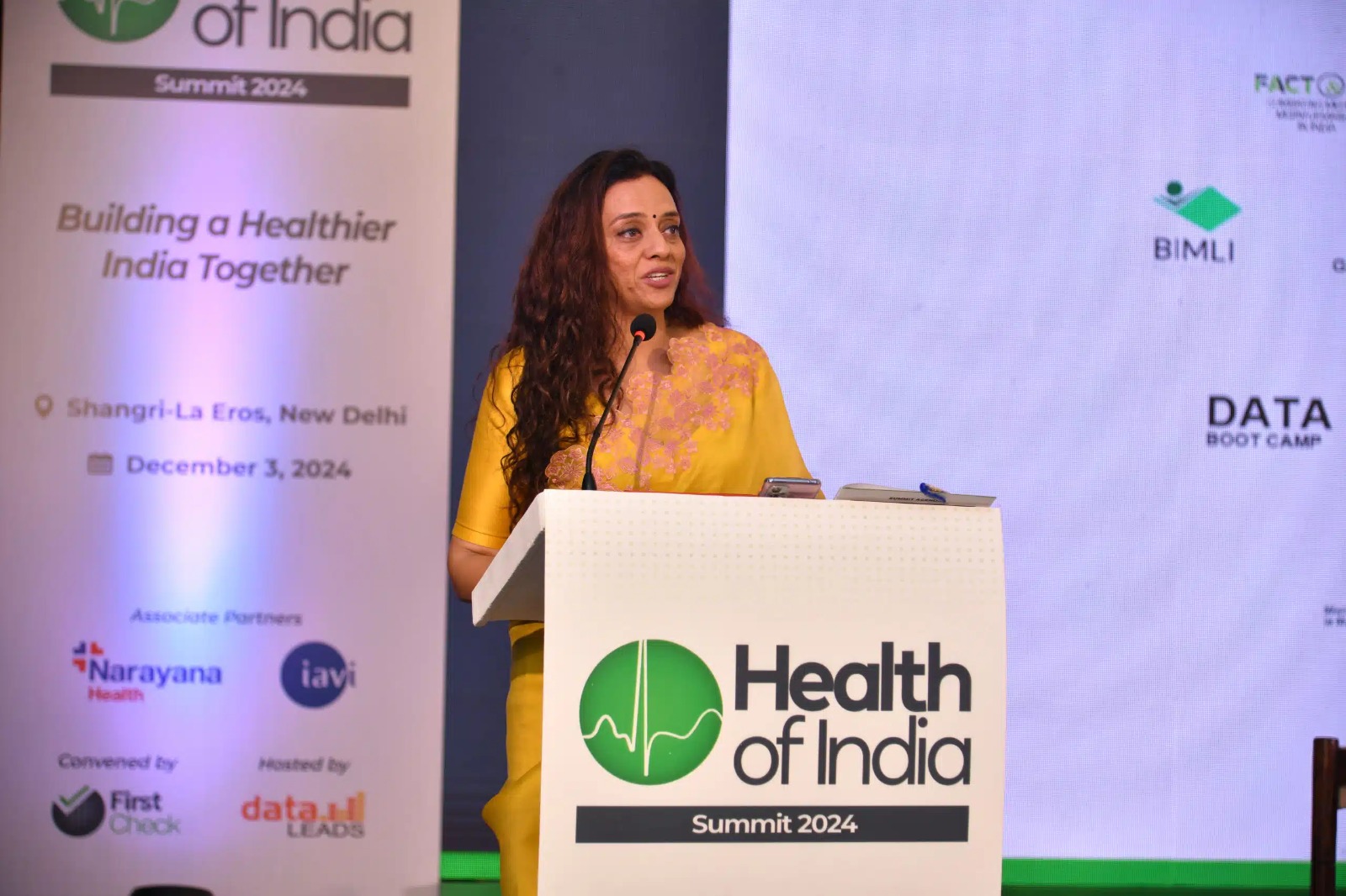 Speaker at the Health of India Summit podium
